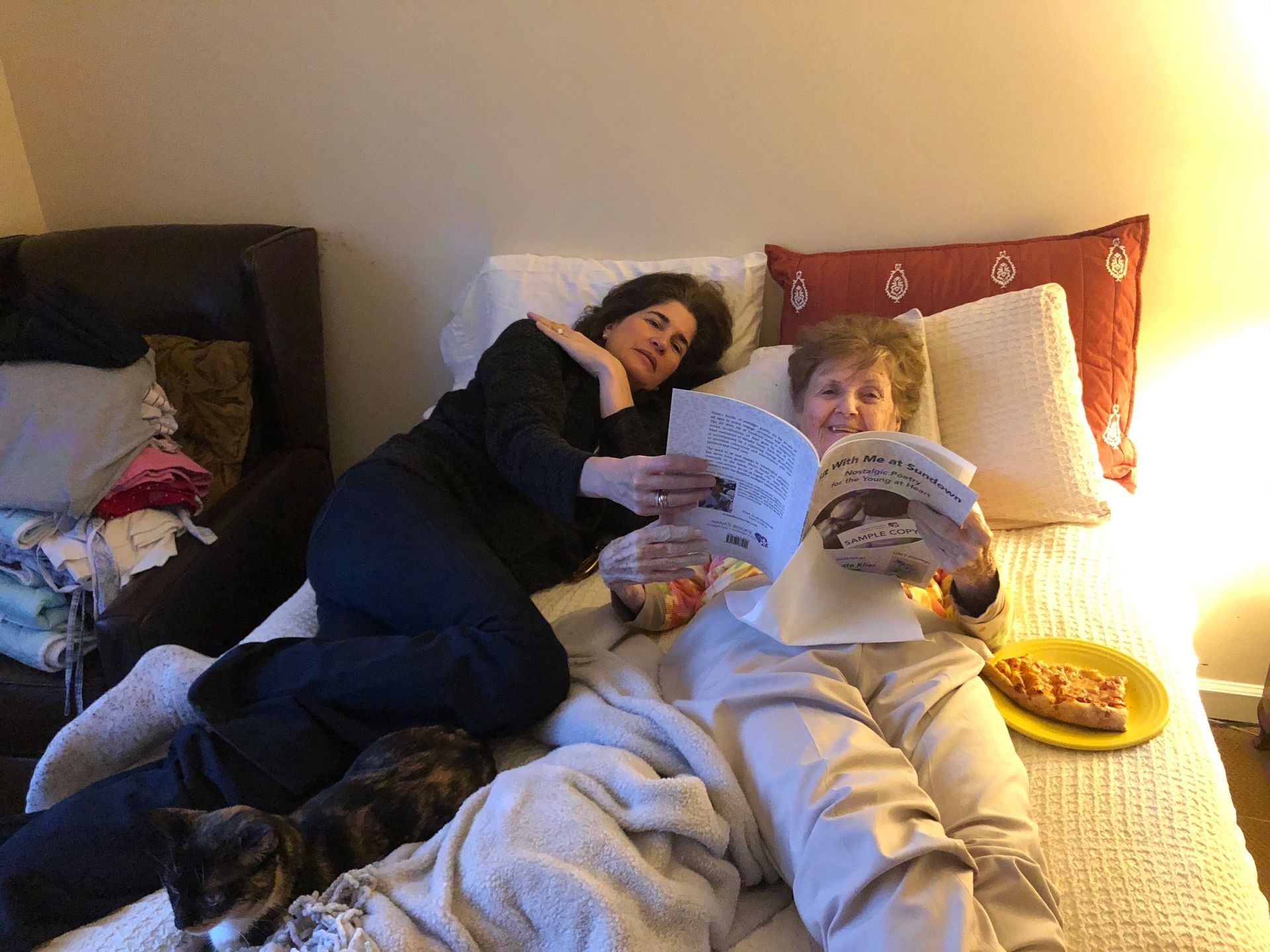 Laurette Klier reading a book to her mom